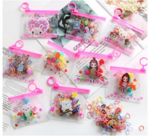 ELASTICO DE CABELO C/ BOLSA PCT 12 PCS - Distribuidora 12 de Outubro